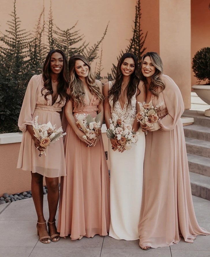 bridal party wearing pink chiffon bridesmaid dresses bought online from Lovely