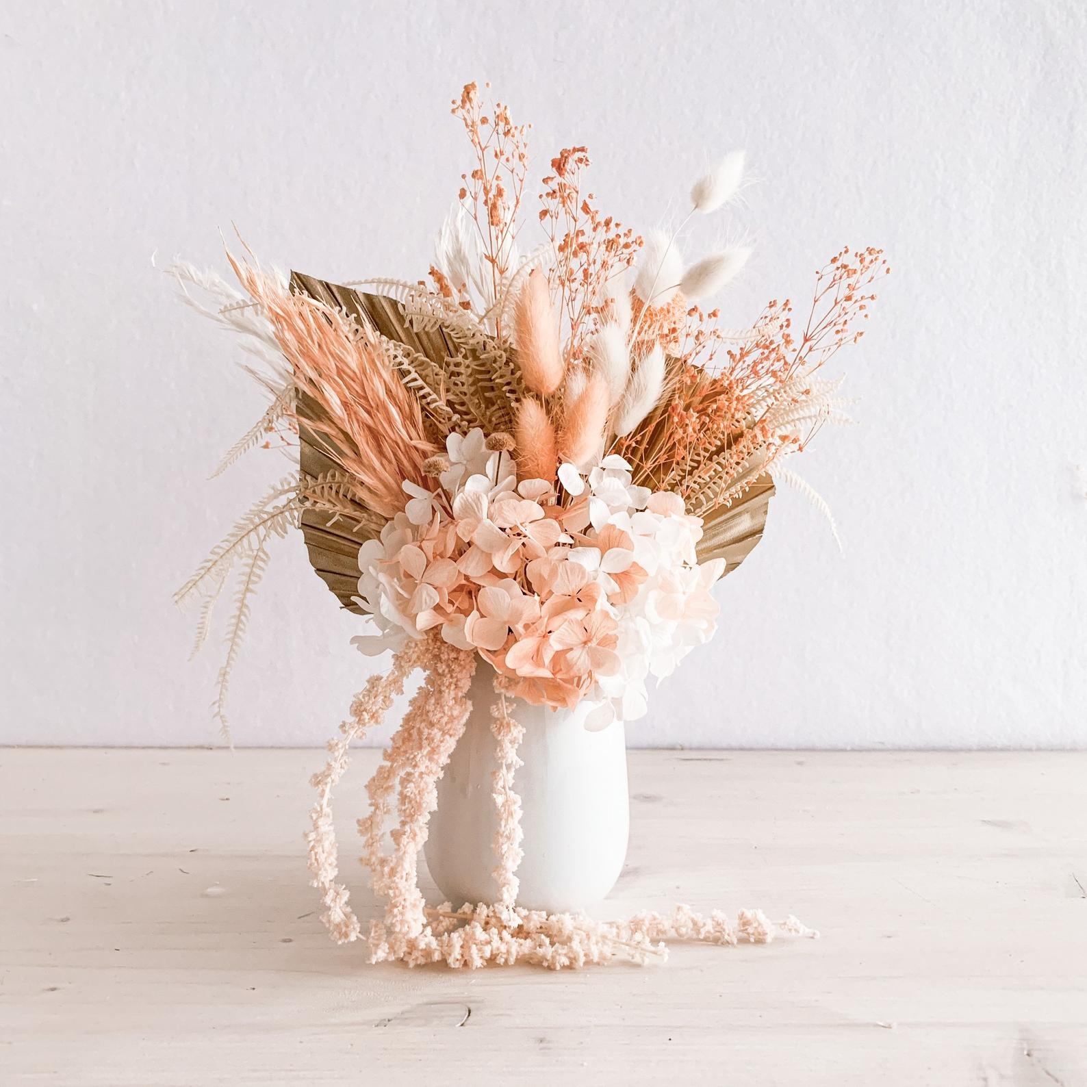 blush pink boho dried floral bouquet in a white vase from Etsy