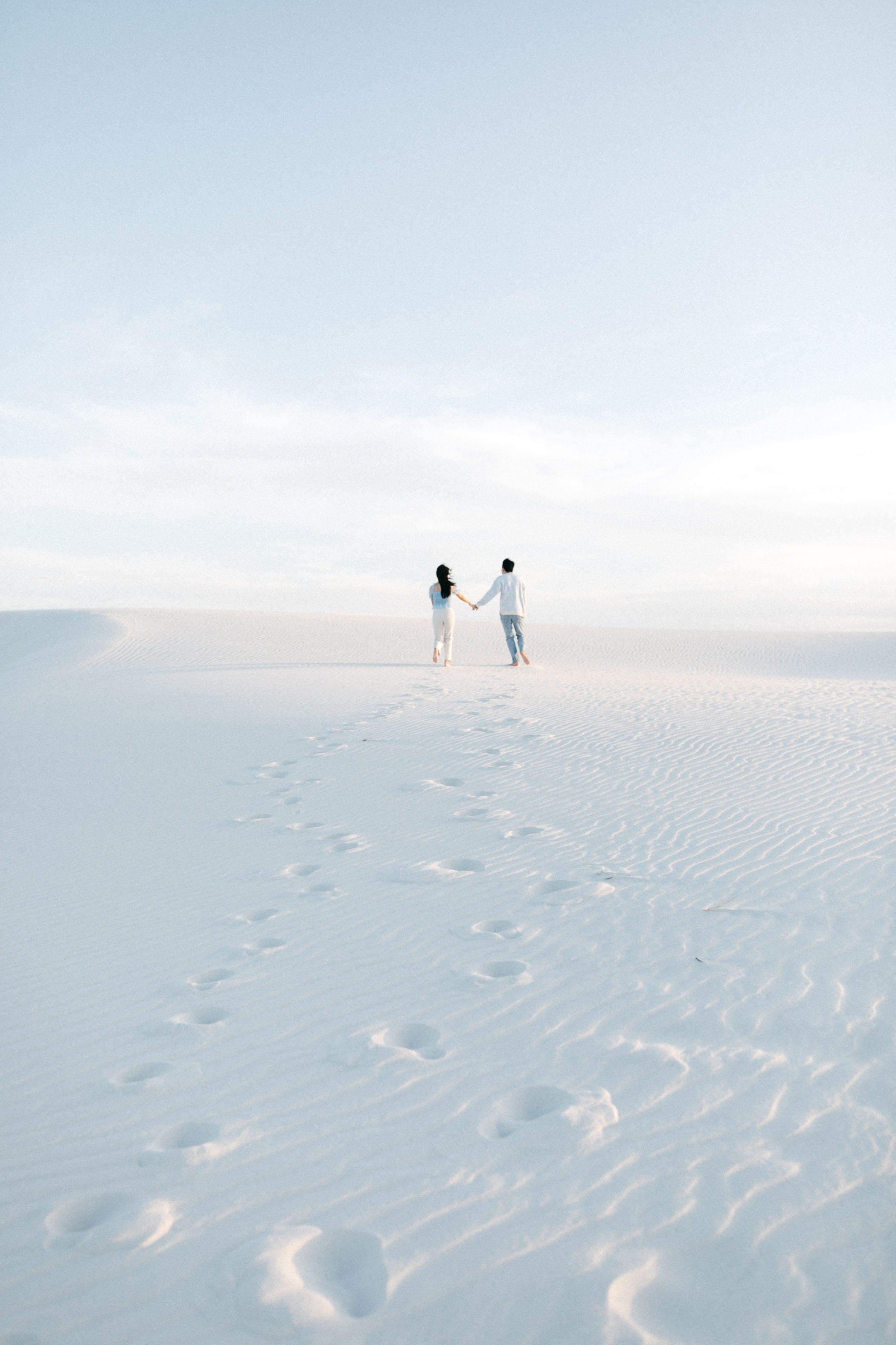 couple adventuring in White Sands in New Mexico