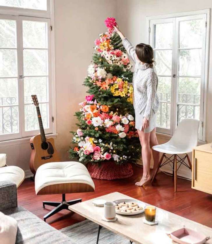 bright cheery faux flower Christmas tree with pink, orange, and yellow accents
