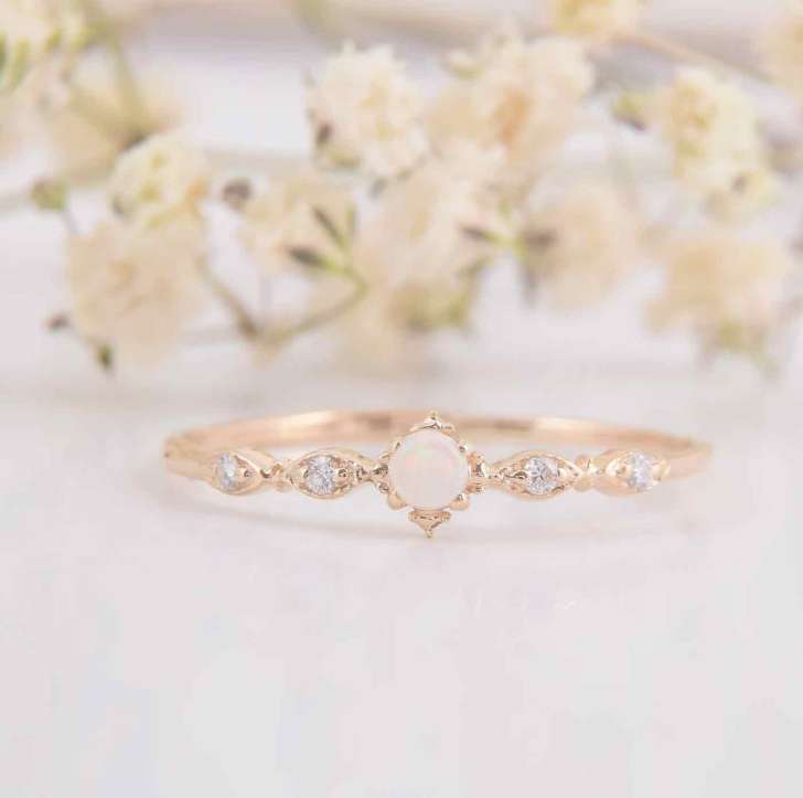 dainty white multi-stone minimalist simple engagement rings