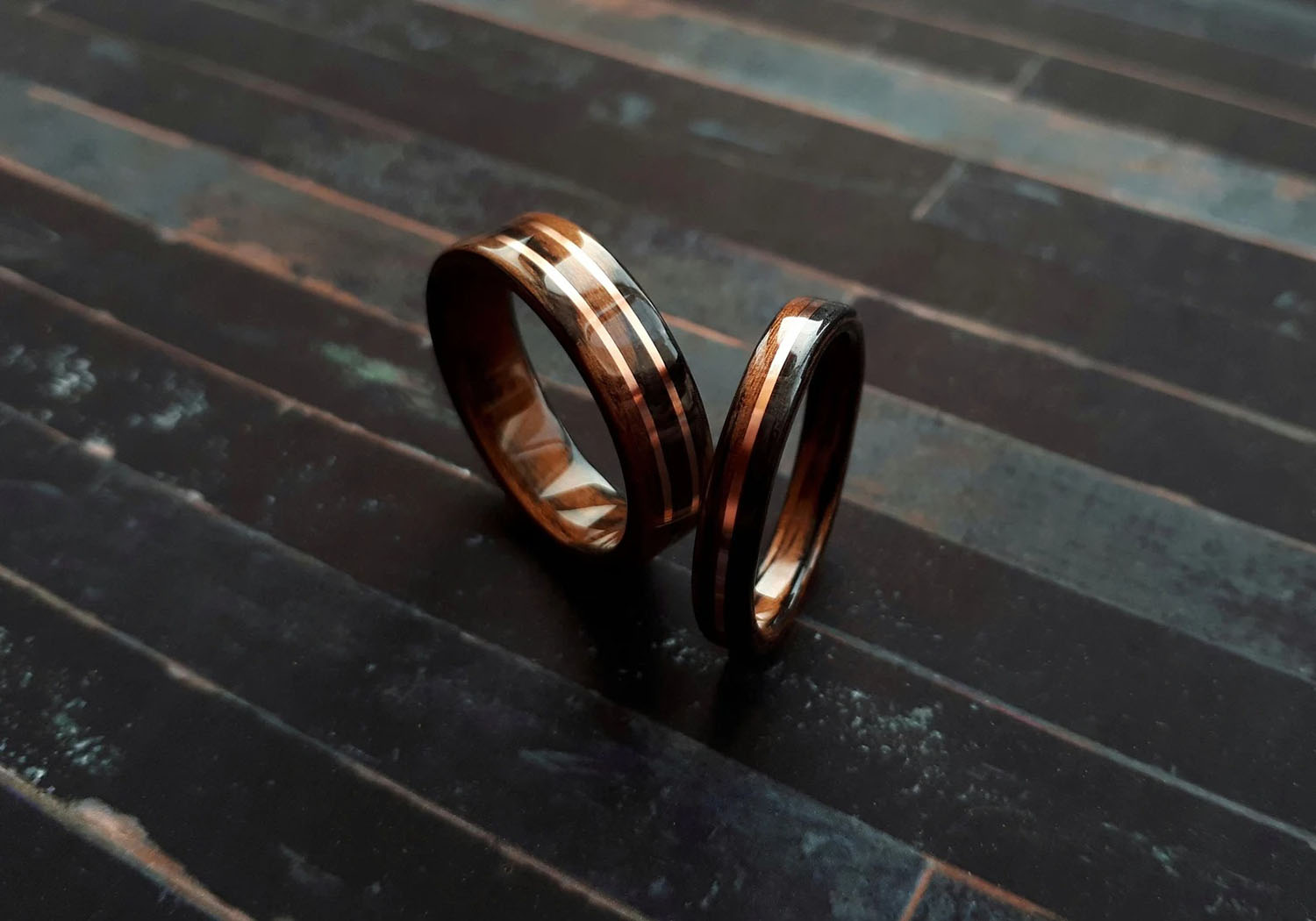 dark mens wood wedding bands with copper inlay