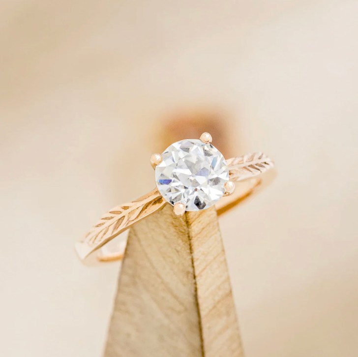 feather accent band gold simple engagement rings with round cut diamond