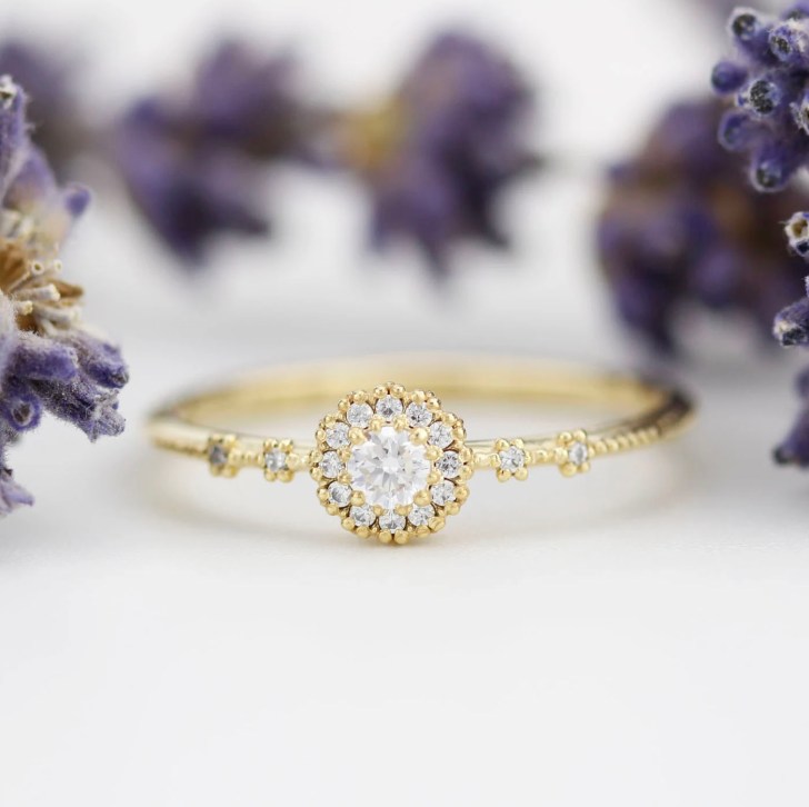 flower-inspired gold diamond elegant simple engagement rings