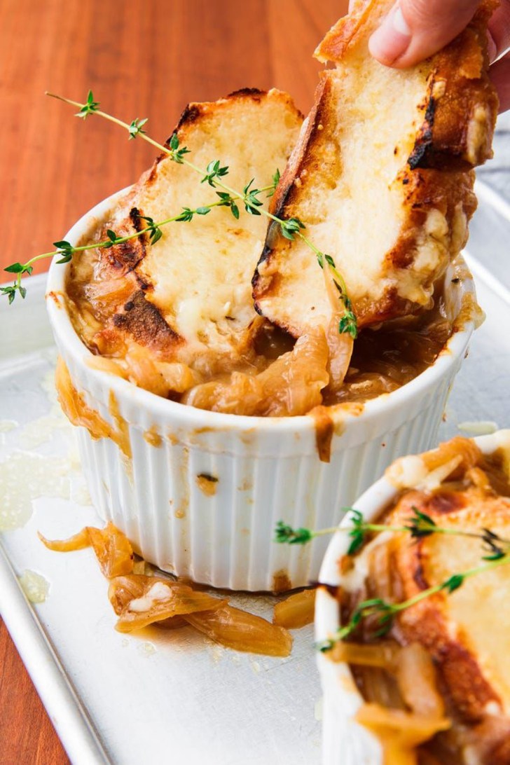 french onion soup garnished with thyme easy comfort food fall dinner ideas and recipes