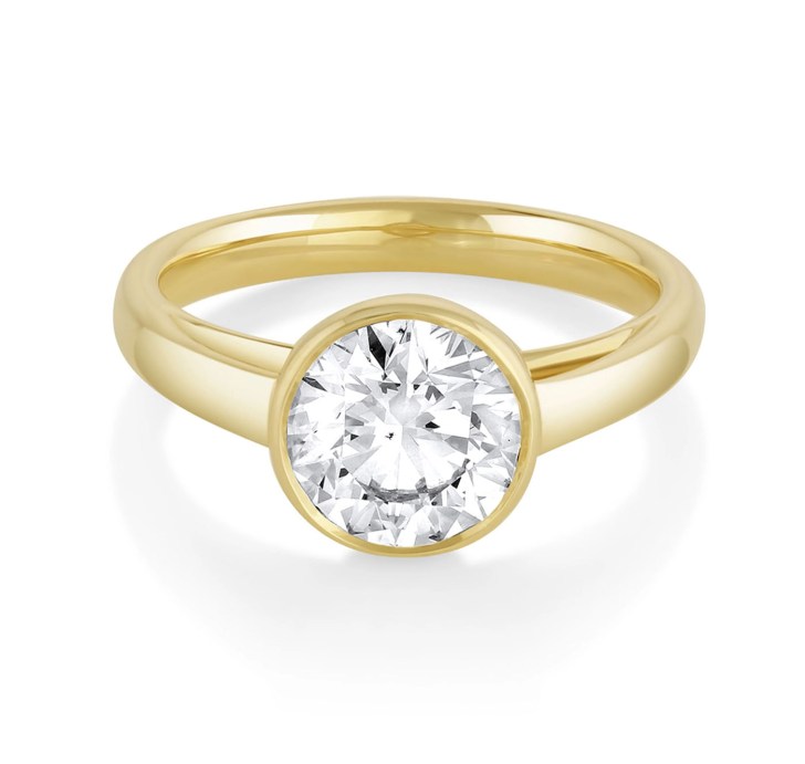 gold bezel set solitaire diamond minimalist simple engagement rings