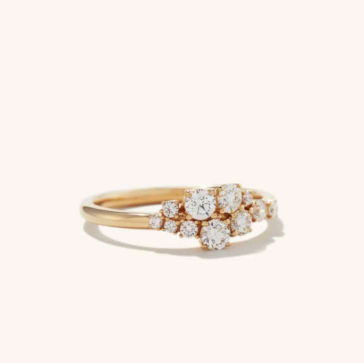 gold simple engagement rings with collection of round cut diamonds