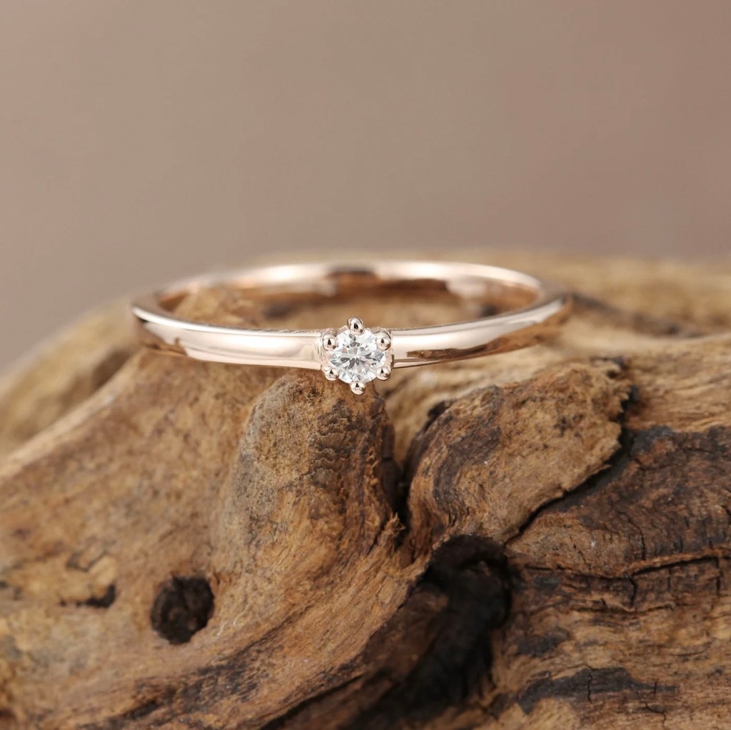 minimalist gold small simple engagement rings with solitaire diamond