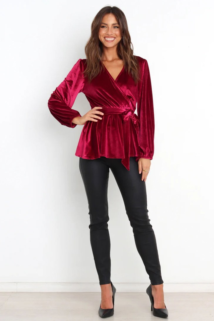plum velvet wrap top best classy Christmas outfits for a work holiday party