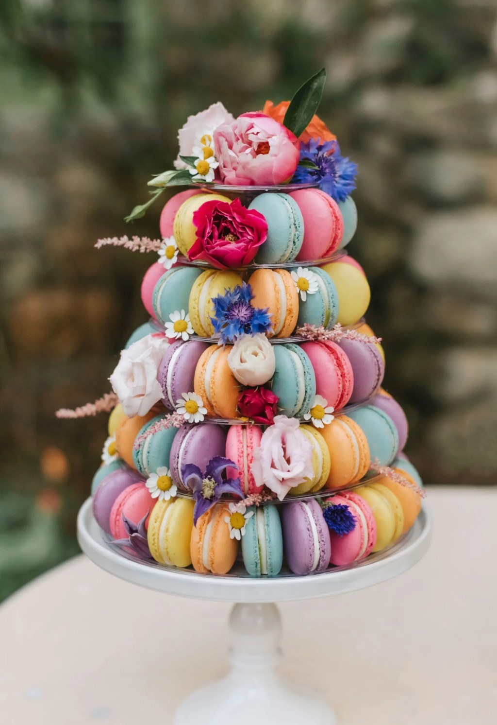 rainbow macaron desert tower with delicate flower details