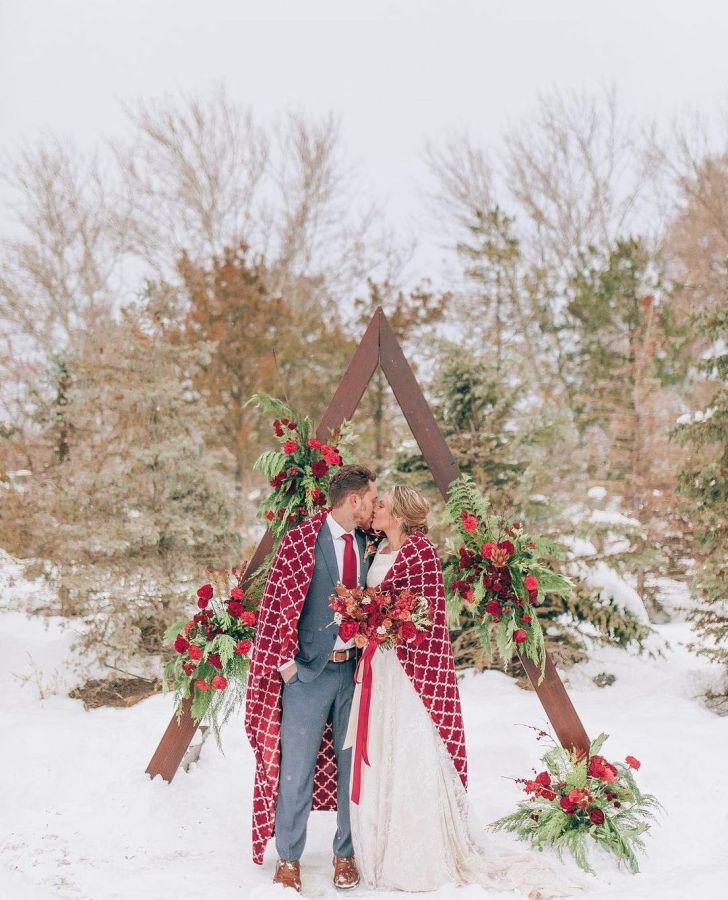rustic wooden triangle arch best Christmas wedding ideas on a budget