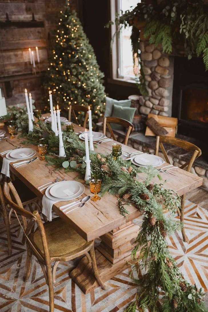 rustic pine garland table runner and amber glasses best Christmas wedding ideas on a budget
