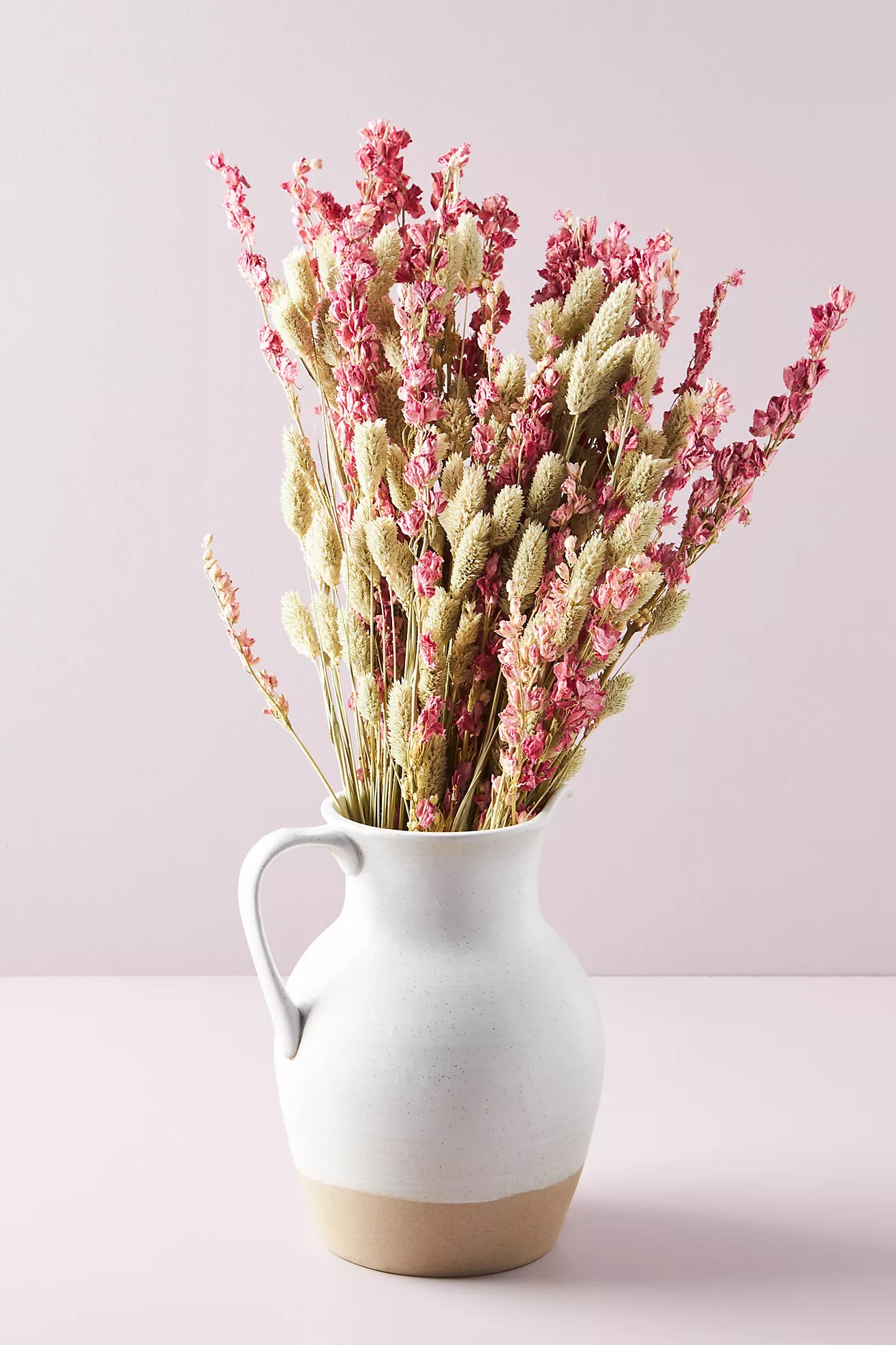 neutral tone blush dried and preserved phalaris and delphinium dried flower bouquet from Anthropologie online